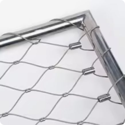 Stainless steel wire rope mesh with ferrule joints fixed to a frame
